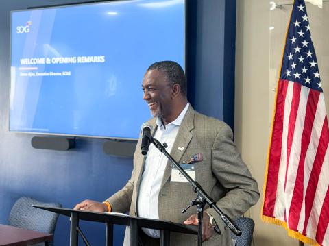 SCAG Executive Director Kome Ajise speaking at podium.